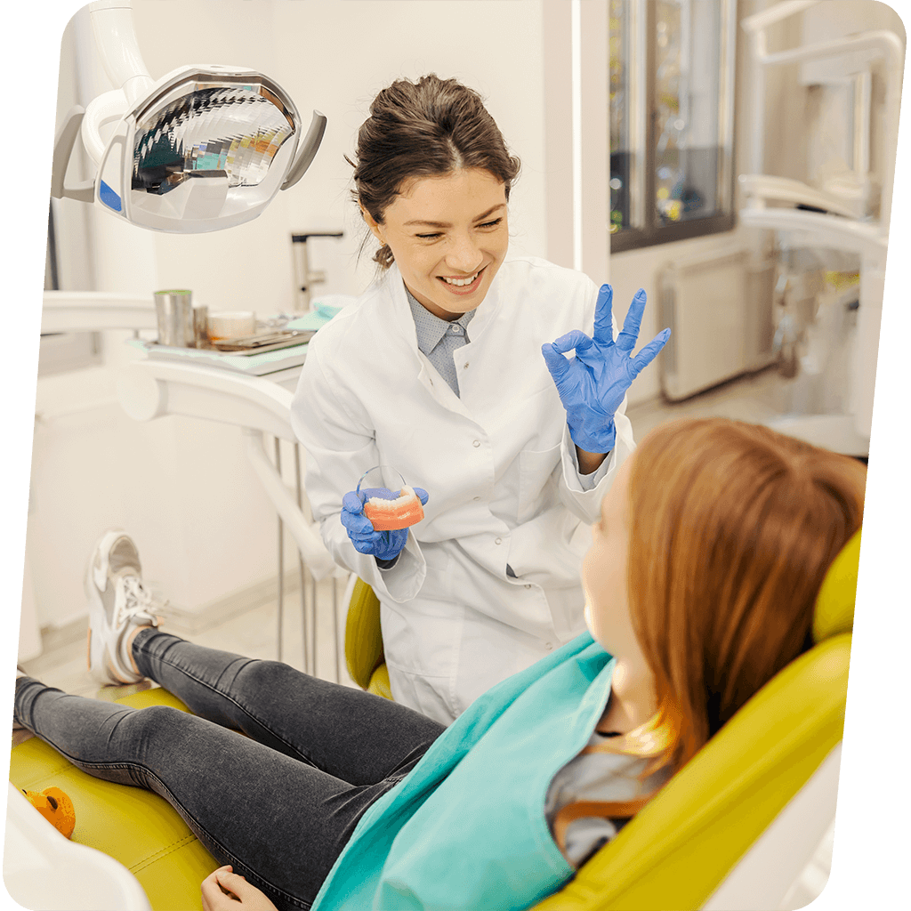 happy family at dental clinic, smiling patients, modern dental office, warm lighting, diverse patients, professional dental care